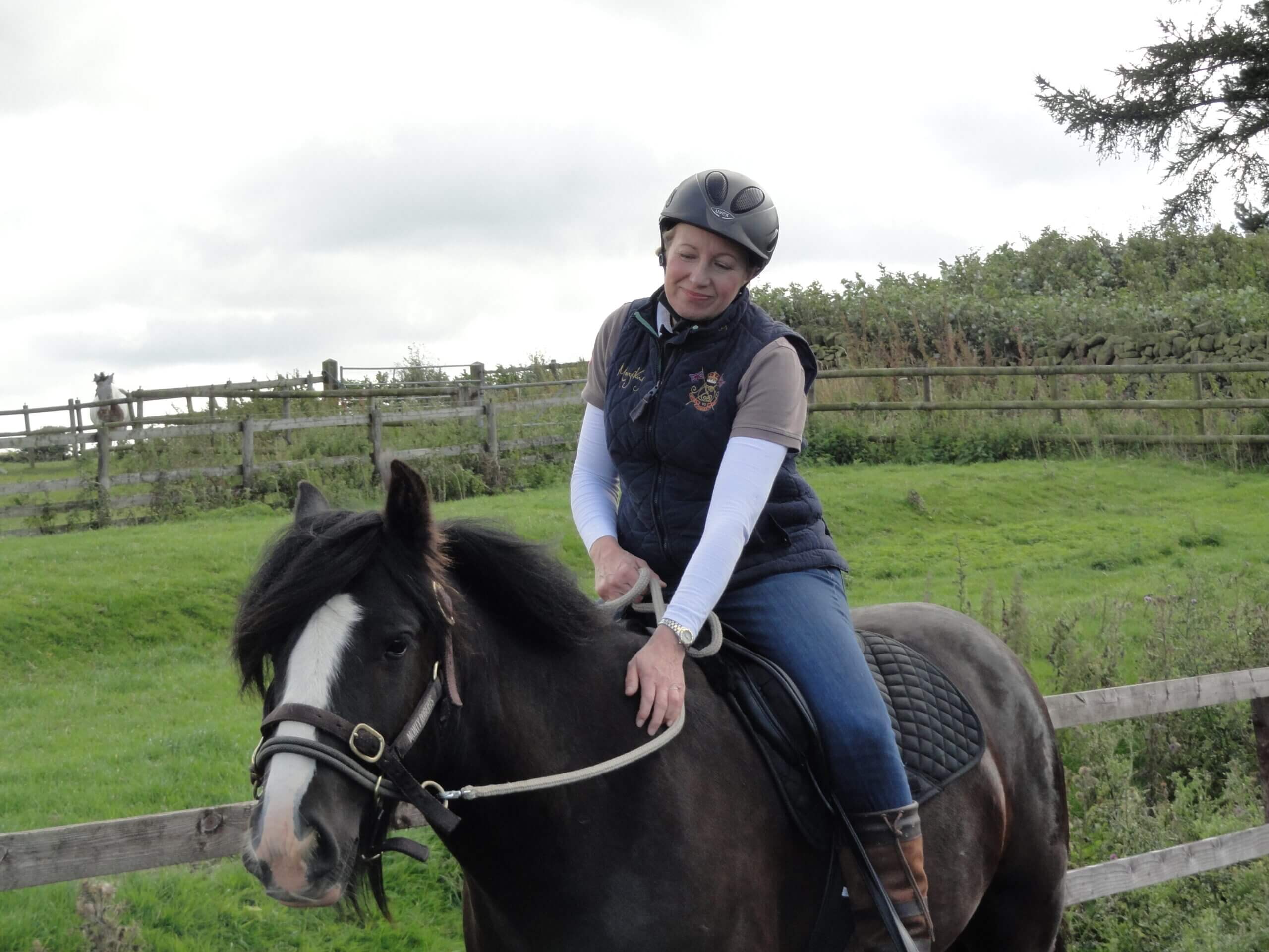 rider and rescued pony on a hack