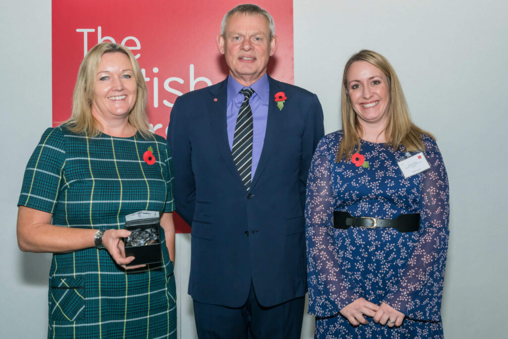 Martin Clunes with members of Bransby horses staff at an awards ceremony