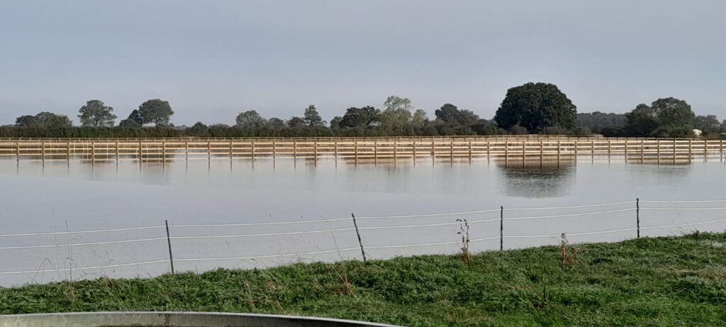 Flooded field at Bransby Horses after Storm Babet dumps a months worth of rain in a day.