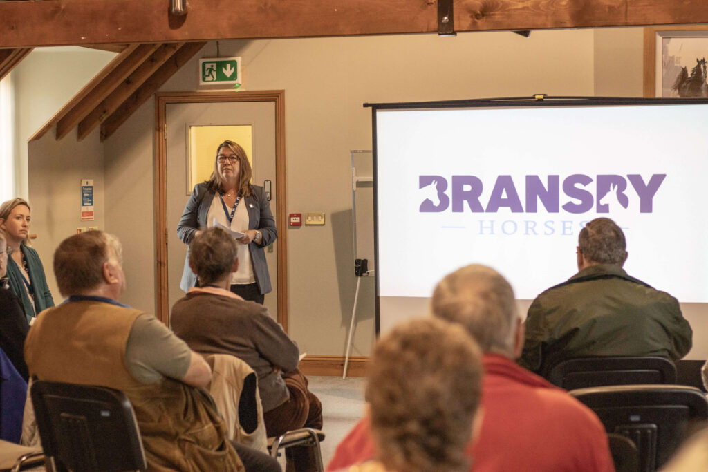 CEO jo snell leading a presentation in the conference room at bransby Horses
